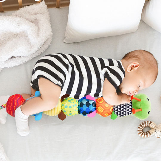 Jouet Musical pour Bébé SensaPillar Tactile et Éveillant 1