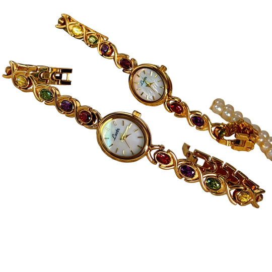Montre Femme Cadran Ovale avec Pierres Précieuses 0