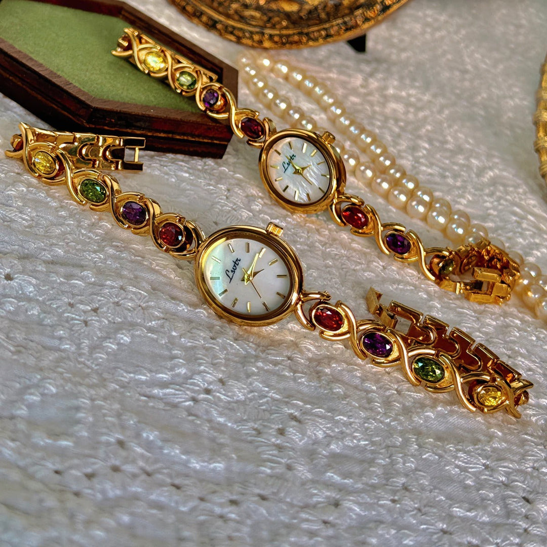 Montre Femme Cadran Ovale avec Pierres Précieuses 1