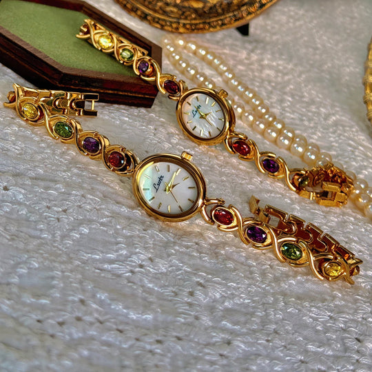 Montre Femme Cadran Ovale avec Pierres Précieuses 1