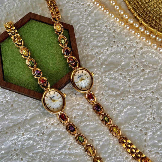 Montre Femme Cadran Ovale avec Pierres Précieuses 2