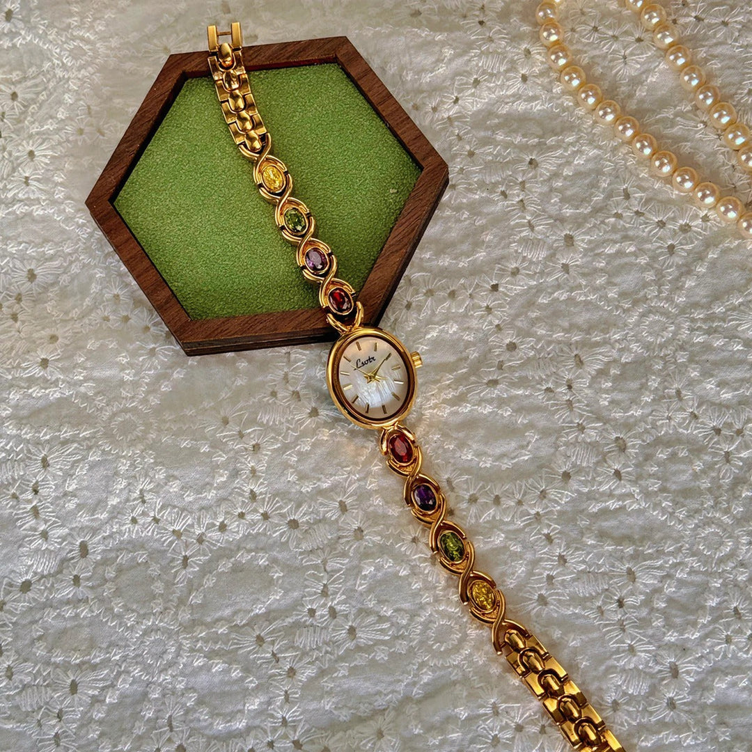 Montre Femme Cadran Ovale avec Pierres Précieuses 4