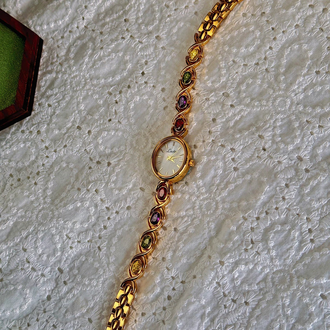 Montre Femme Cadran Ovale avec Pierres Précieuses 5