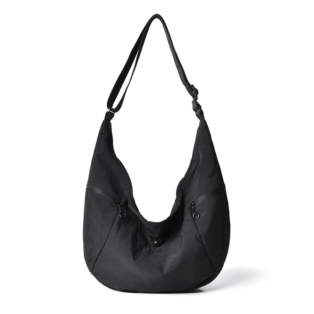 Sac à bandoulière femme multi-poches léger et fonctionnel 1