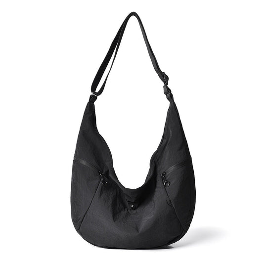 Sac à bandoulière femme multi-poches léger et fonctionnel 1