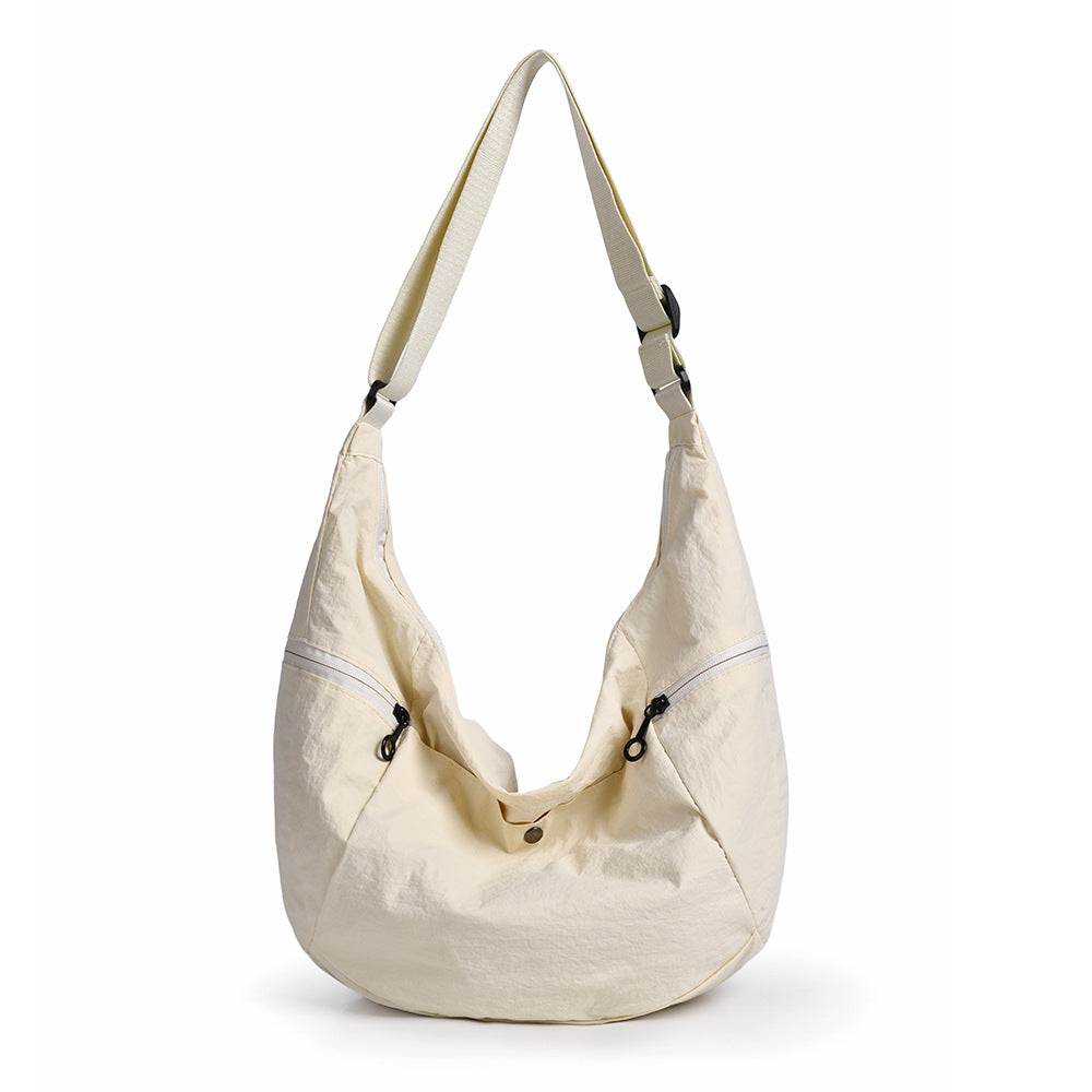 Sac à bandoulière femme multi-poches léger et fonctionnel 3