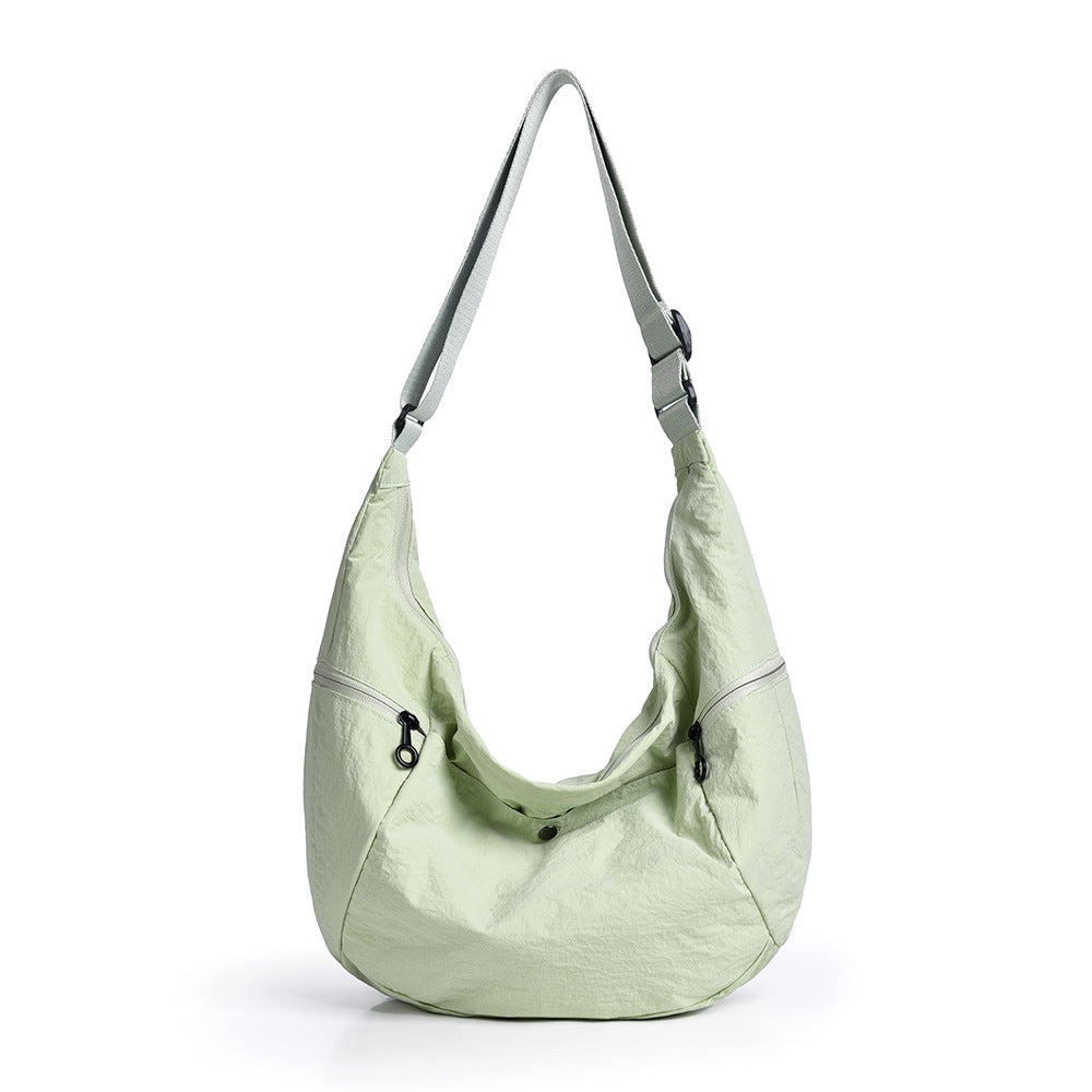 Sac à bandoulière femme multi-poches léger et fonctionnel 4