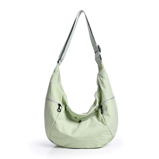 Sac à bandoulière femme multi-poches léger et fonctionnel 4