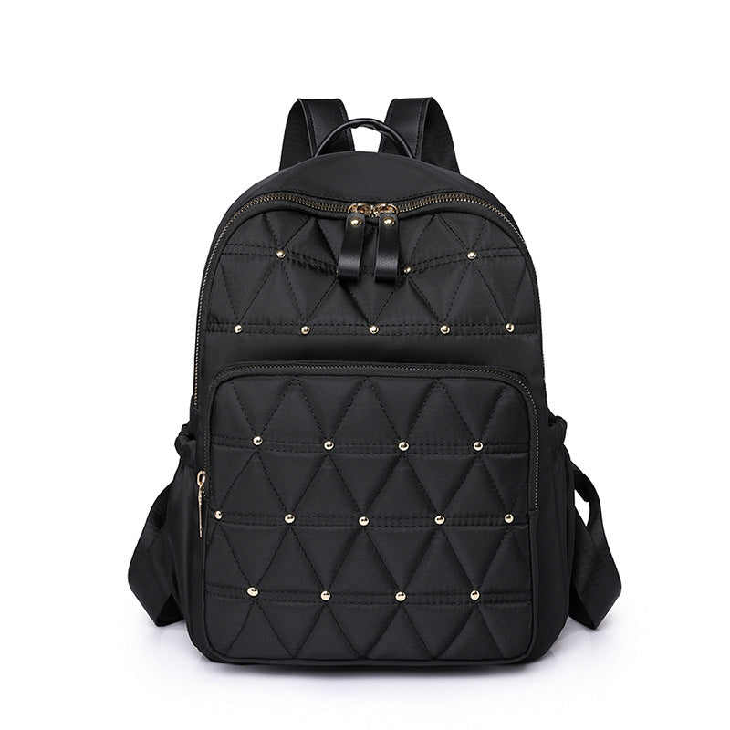 Sac à dos matelassé pour femme avec détails métalliques 0