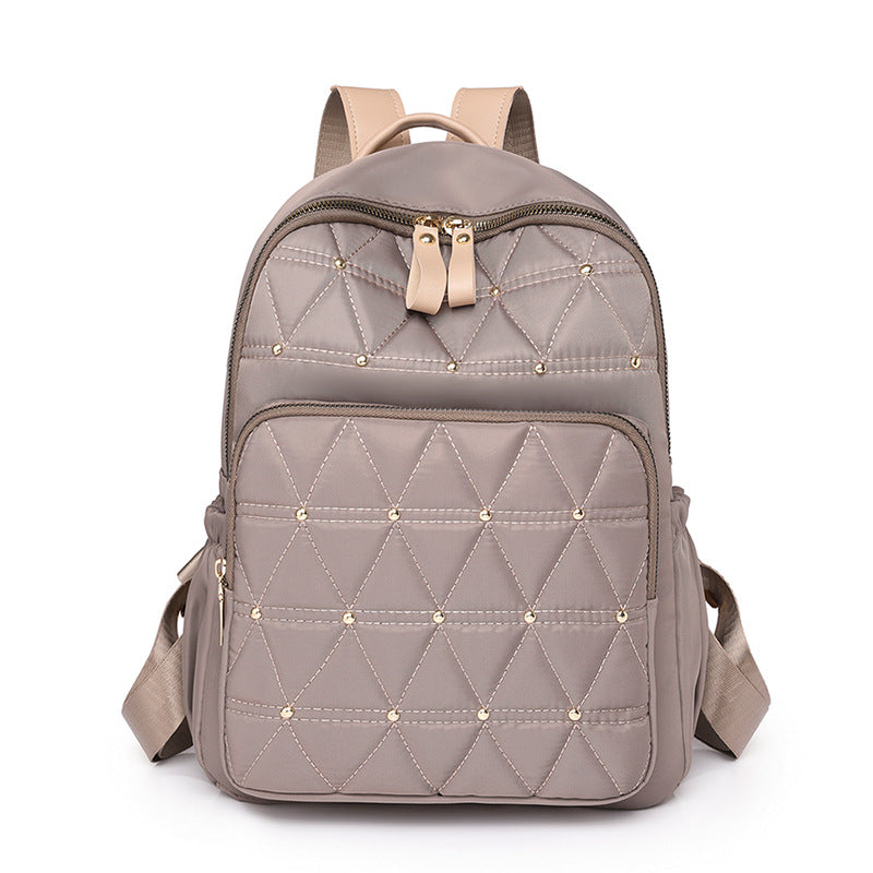 Sac à dos matelassé pour femme avec détails métalliques 2