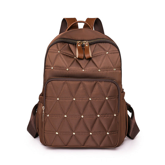 Sac à dos matelassé pour femme avec détails métalliques 3
