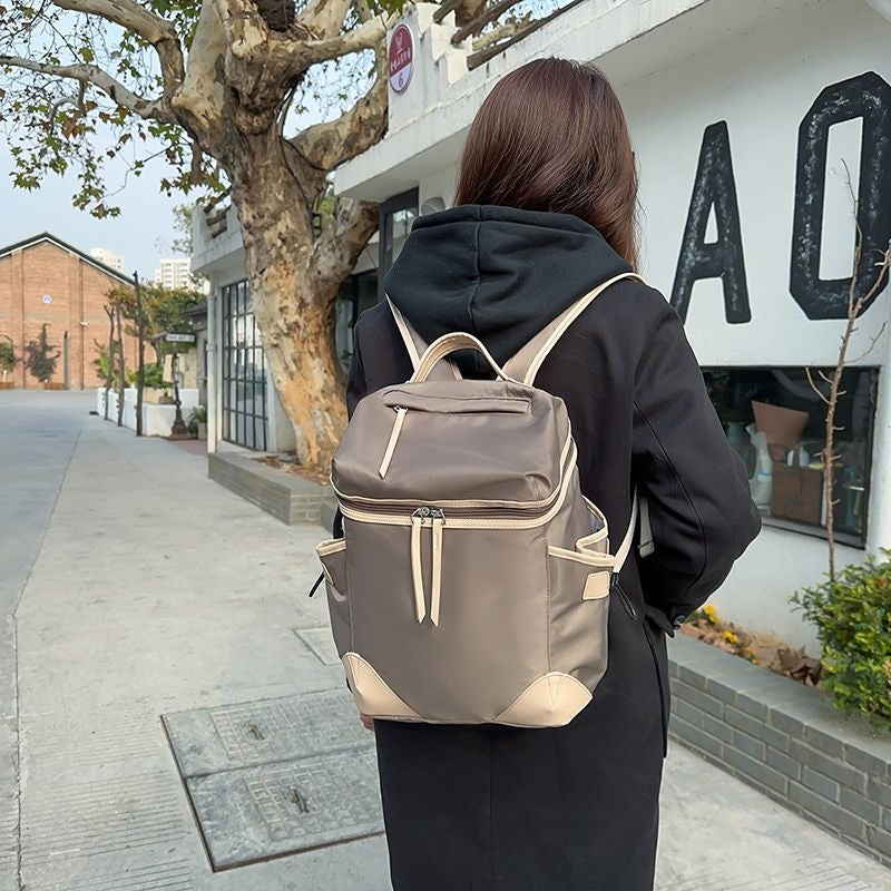 Sac à dos multifonctionnel pour homme avec compartiments spacieux et poches latérales en filet 2