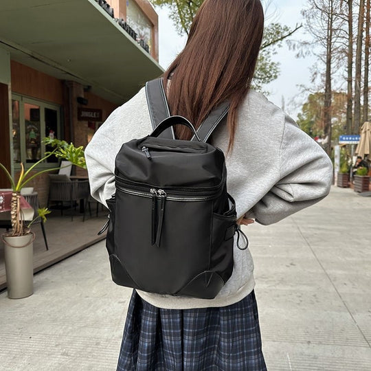 Sac à dos multifonctionnel pour homme avec compartiments spacieux et poches latérales en filet 3