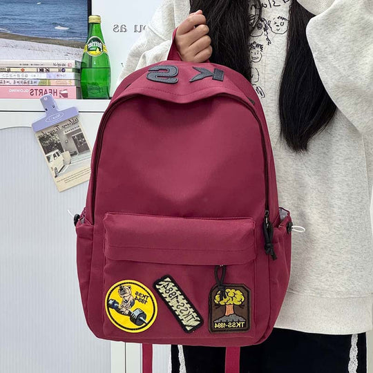 Sac à dos unisexe avec patch brodé tendance 1