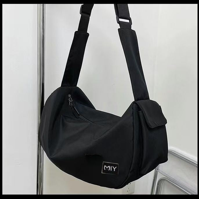 Sac bandoulière femme design moderne avec compartiments pratiques 7