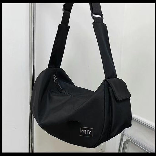 Sac bandoulière femme design moderne avec compartiments pratiques 7