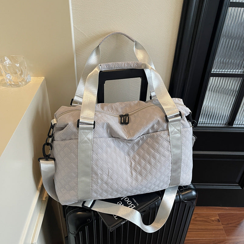Sac de voyage matelassé polyvalent pour homme et femme 1