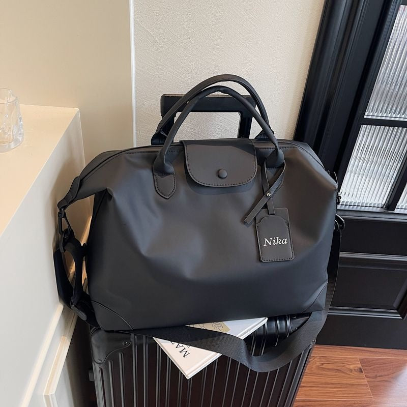 Sac de voyage polyvalent pour homme et femme au design moderne 0