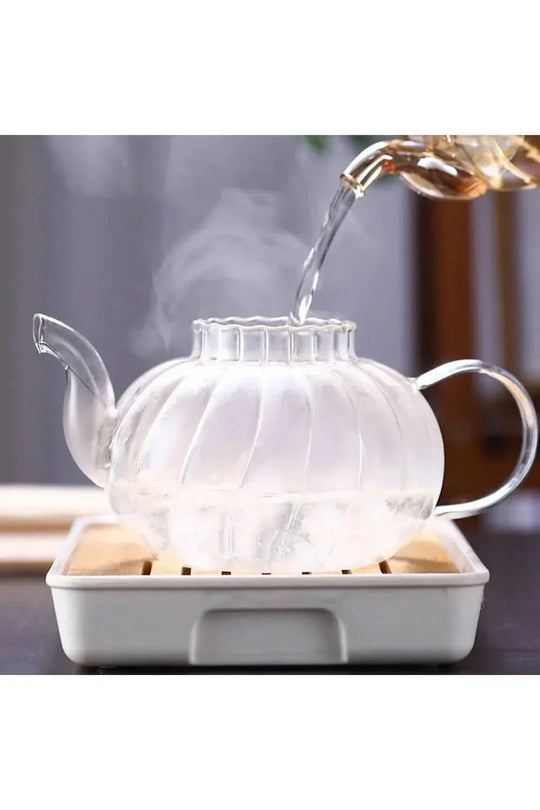 Théière en verre avec infuseur pour un service élégant 2