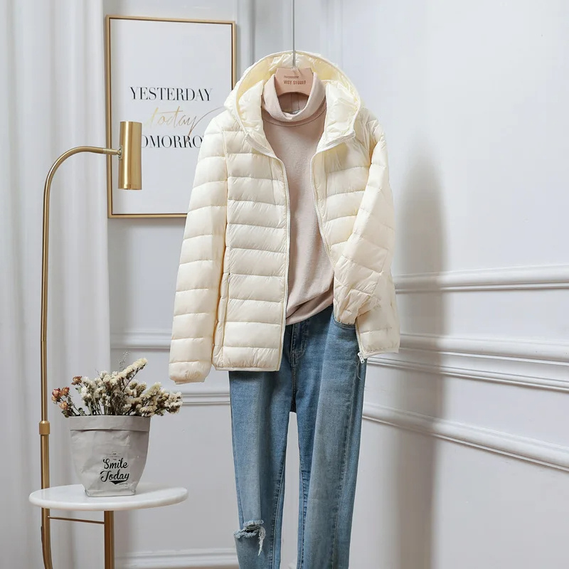 Veste Puffer Femme Capuche Design Pliable 1