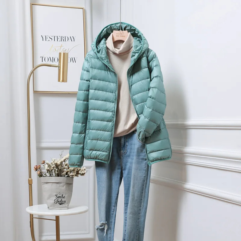 Veste Puffer Femme Capuche Design Pliable 4