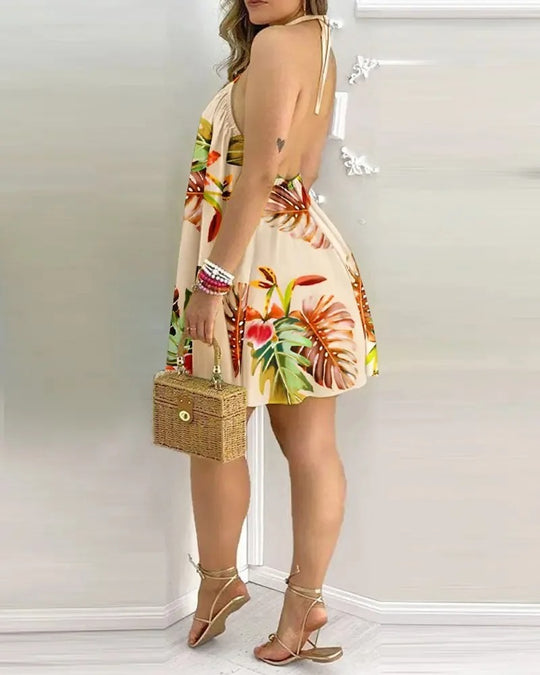 Robe dos nu à imprimé tropical