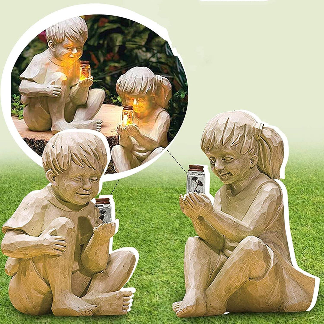 Enfants avec lucioles solaires Statues de jardin